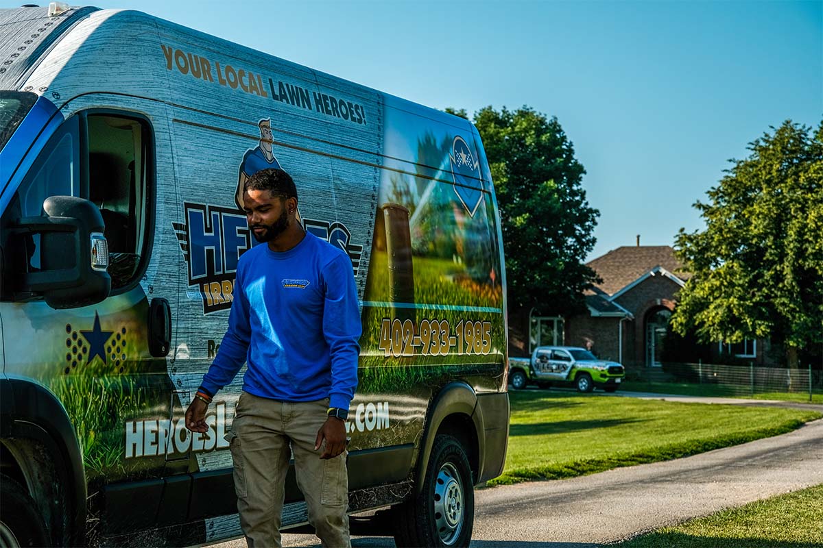 Heroes Lawn Care Staff with Company Vehicle